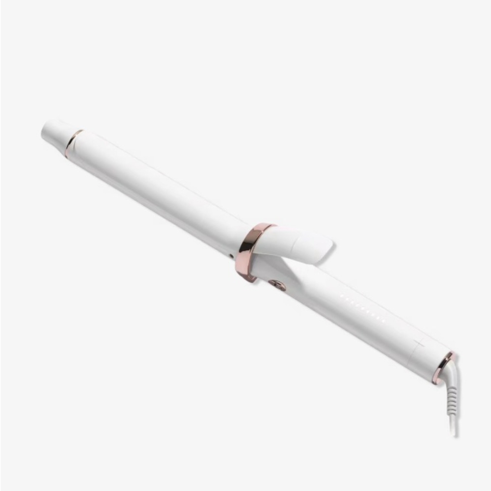 T3 1 1/4” curling iron. Works great!